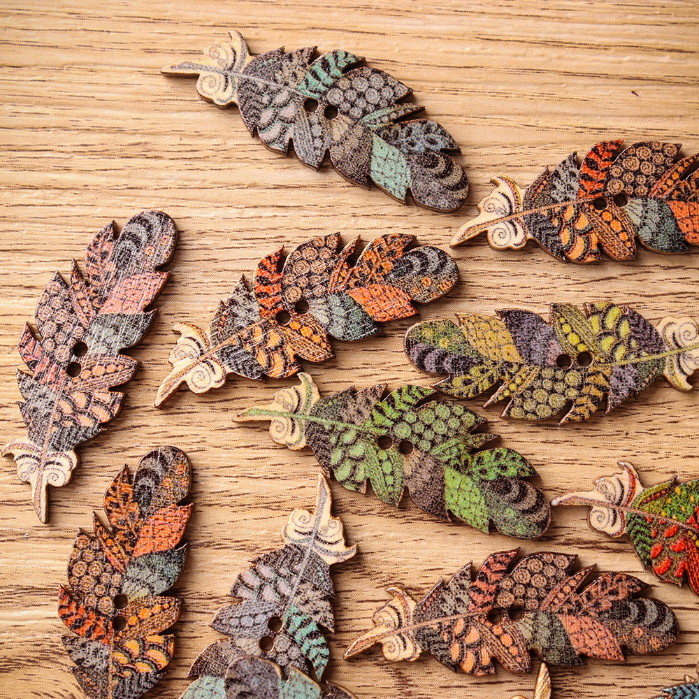 
	50 Pcs Feather Shape Natural Wood Sewing Buttons Fastness DIY Wooden Buttons Handcraft Material